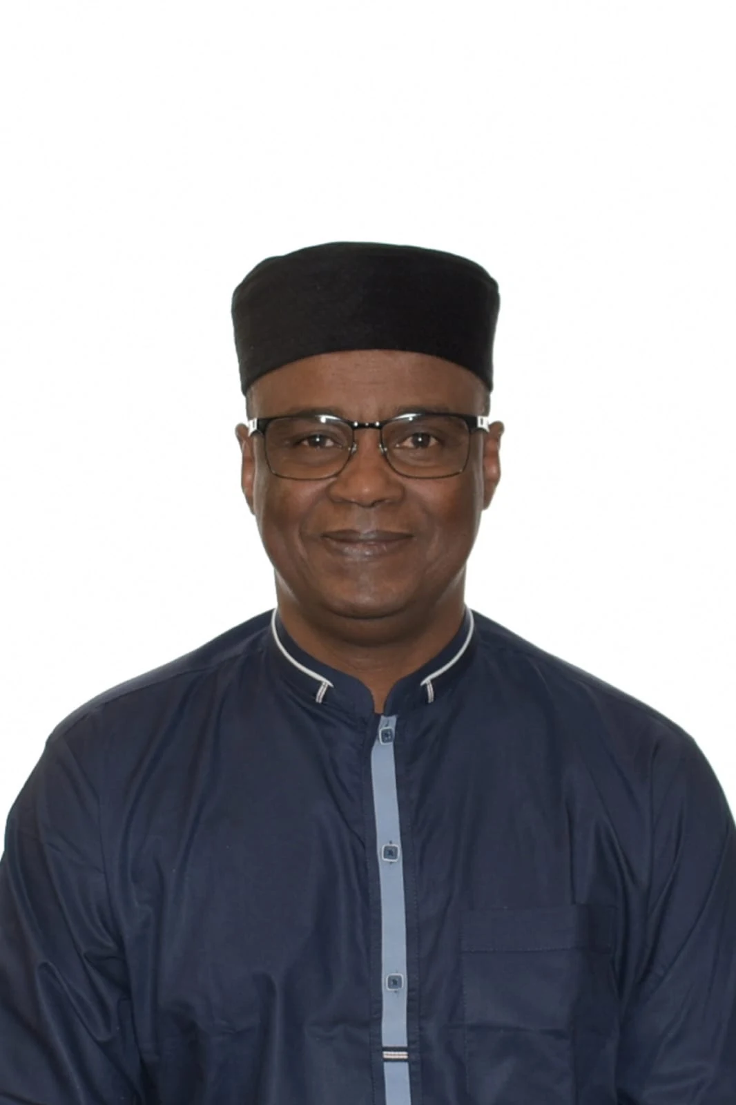 Portrait of Souley Dounda in a navy boubou and black cap